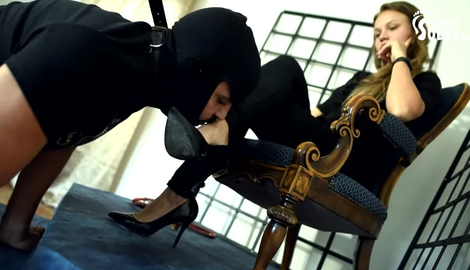 Foot slave under his s feet and heels of Czech Soles studio