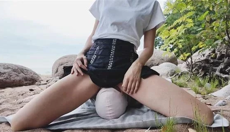 His head is under my skirt I'm sitting on his face in a public place on the beach (Facesitting) with Ava Krass